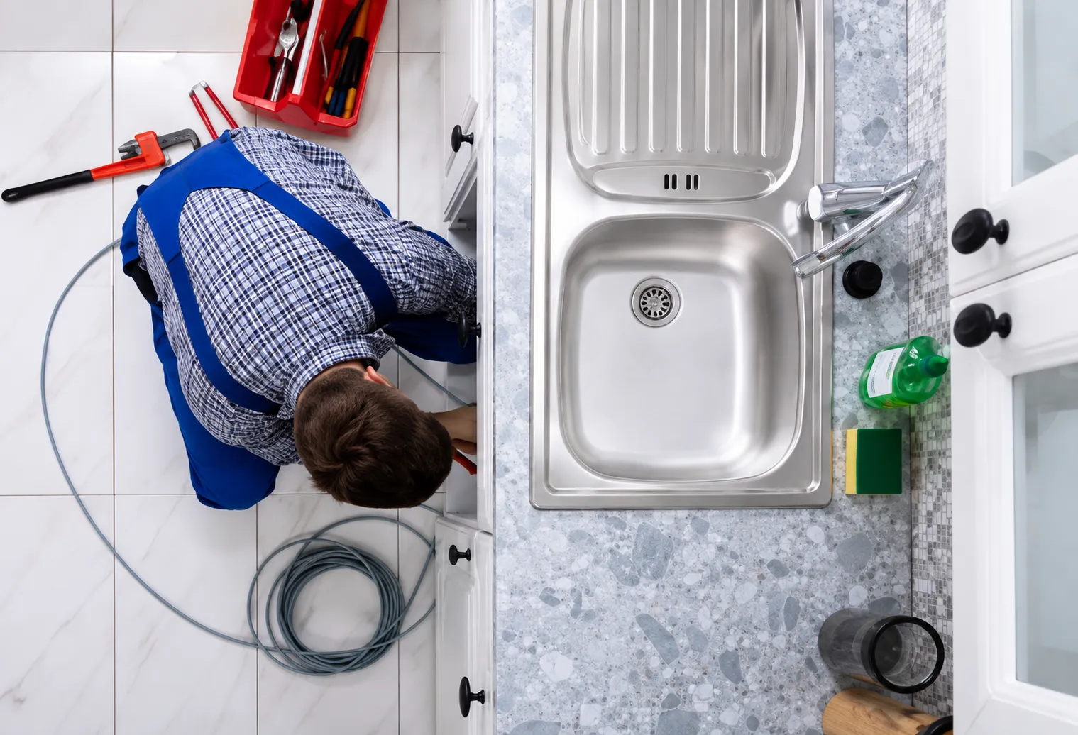 Man repairing a leak